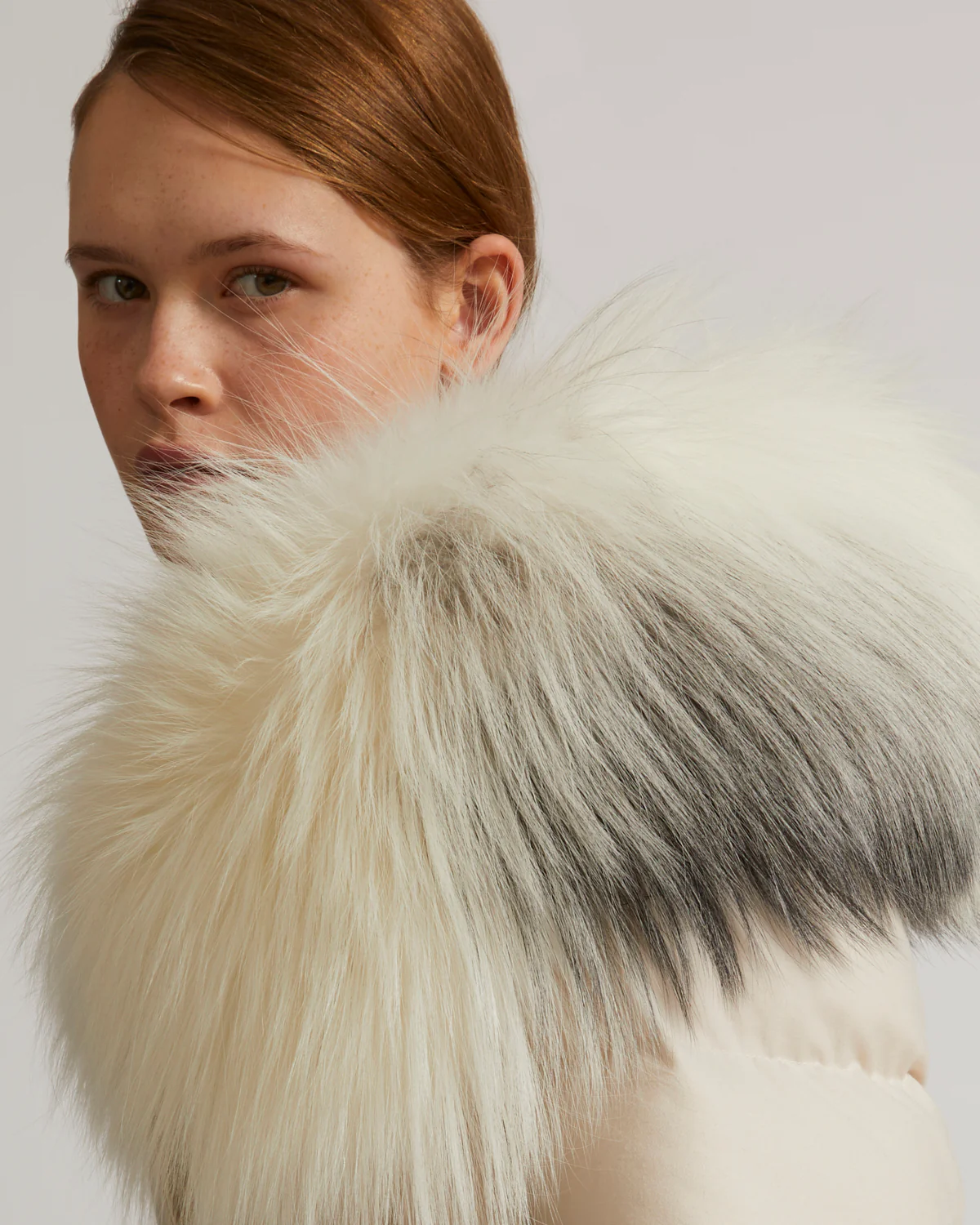Short down jacket in waterproof flannel fabric with fox hood trim - Image 3